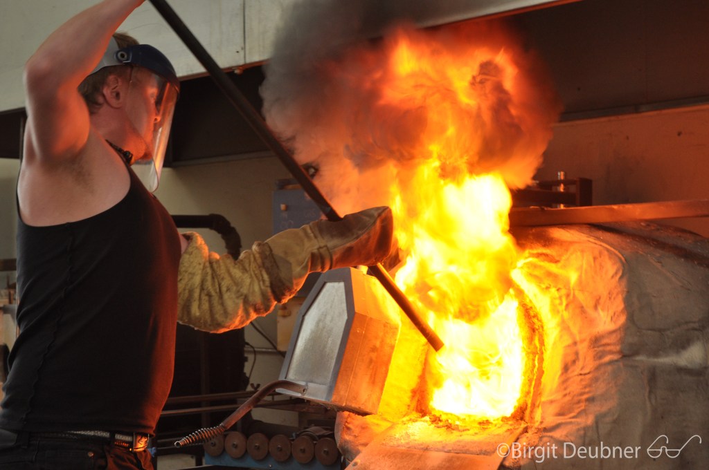 The Glass Studio : throwing kerosene into the furnace..