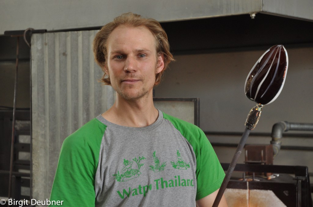 Jason Stropko creating another blown & sculpted glass sunflower seed for his signature collection of glass nuts & seeds ..
