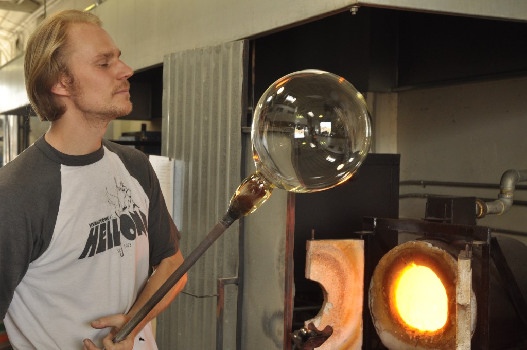 Jason blowing a huge clear glass bubble... 